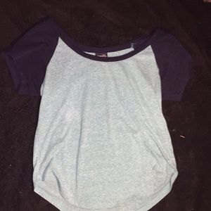 Light and navy blue tee.